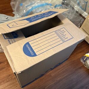 Over 50 shirts, plus 2 pairs of khaki pants (32/32 & 34/32), and some XL shorts.